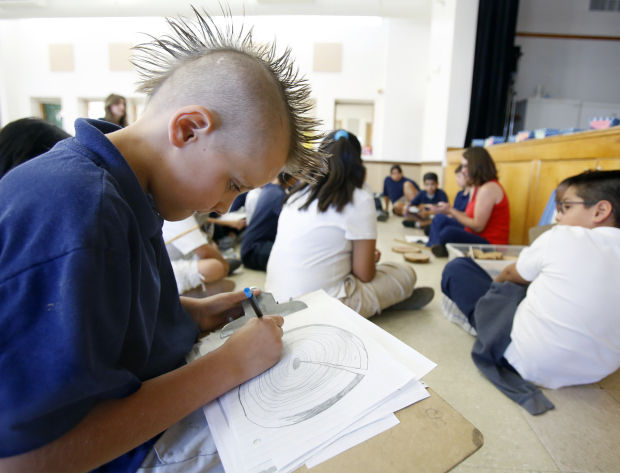 Losing Ground: Volunteers inspire at J.B. Wright Elementary School